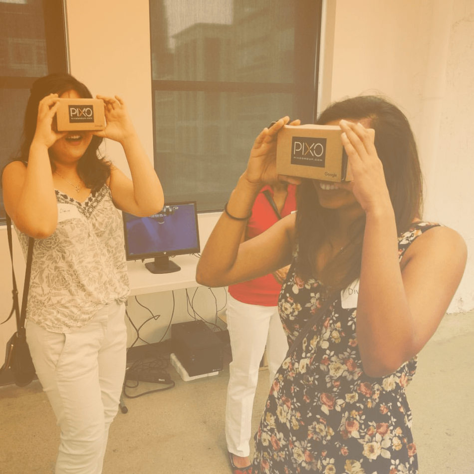 girls using google cardboard virtual reality at grand circus detroit michigan coding bootcamp