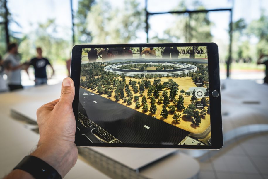 Someone looking at a diagram of a forest on a tablet